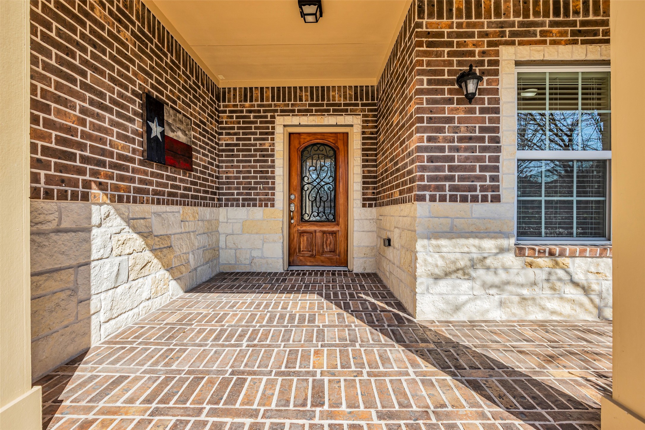 323 Texas Avenue Arcola, TX 77583 - Photo 3 of 27 a view of a brick house with many windows