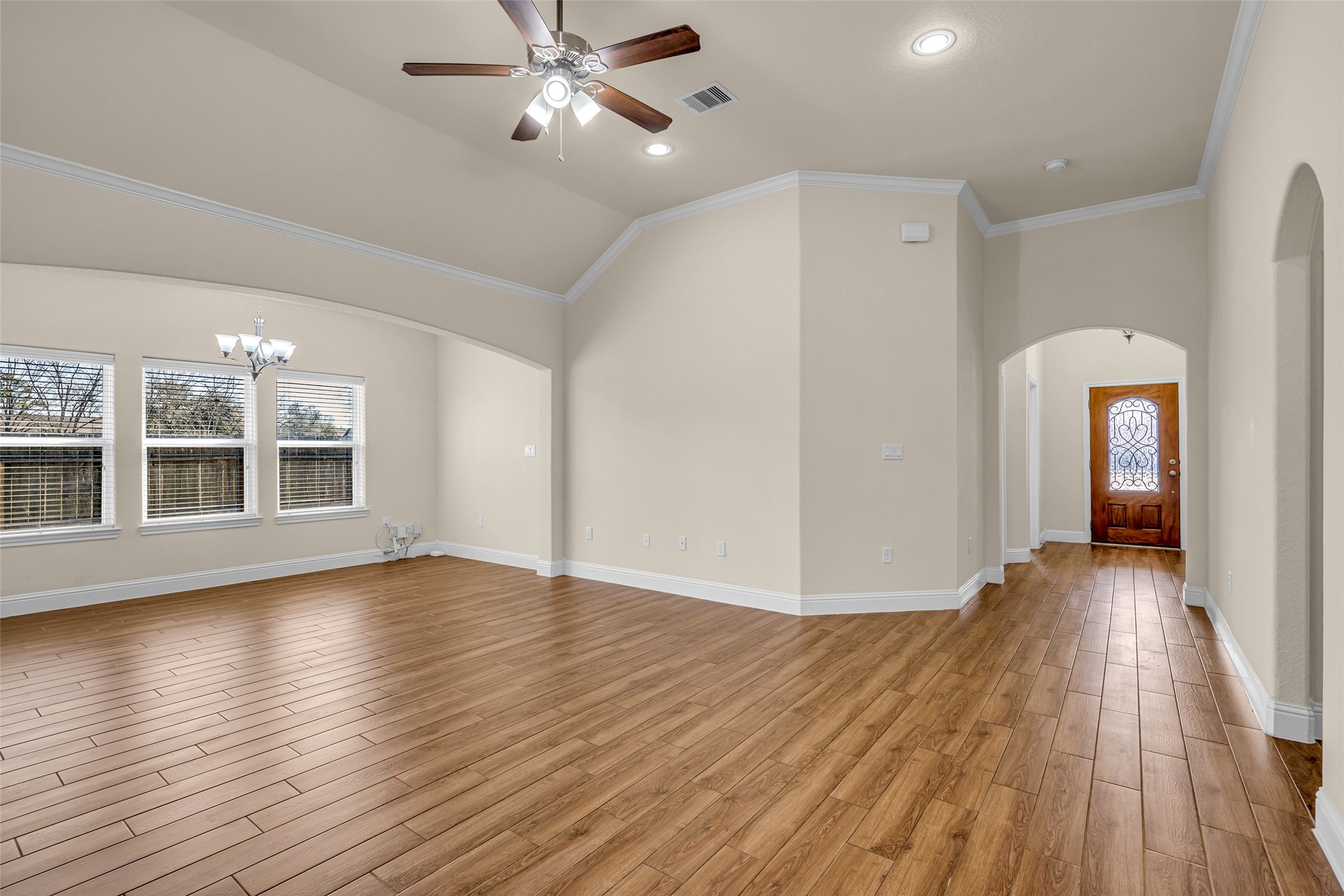 323 Texas Avenue Arcola, TX 77583 - Photo 8 of 27 a view of empty room with wooden floor