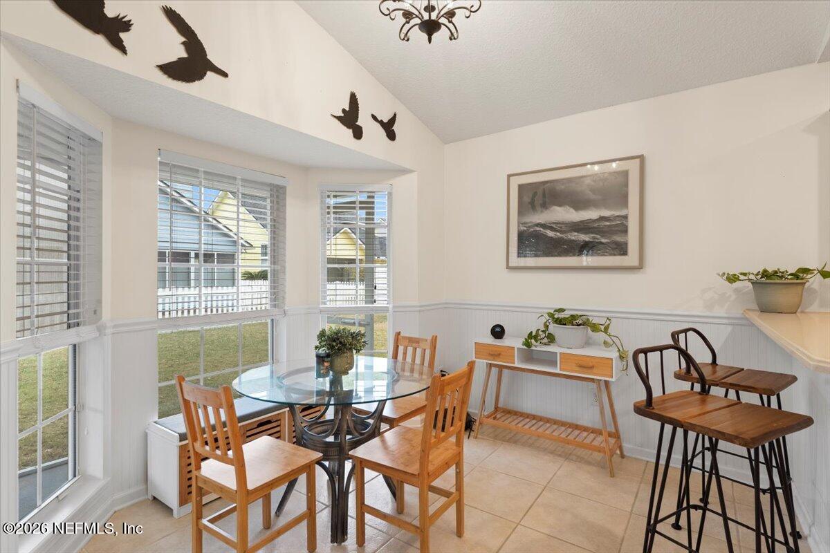 1489 Marshview Court Atlantic Beach, FL 32233 - Photo 11 of 47 a dining room with furniture and window