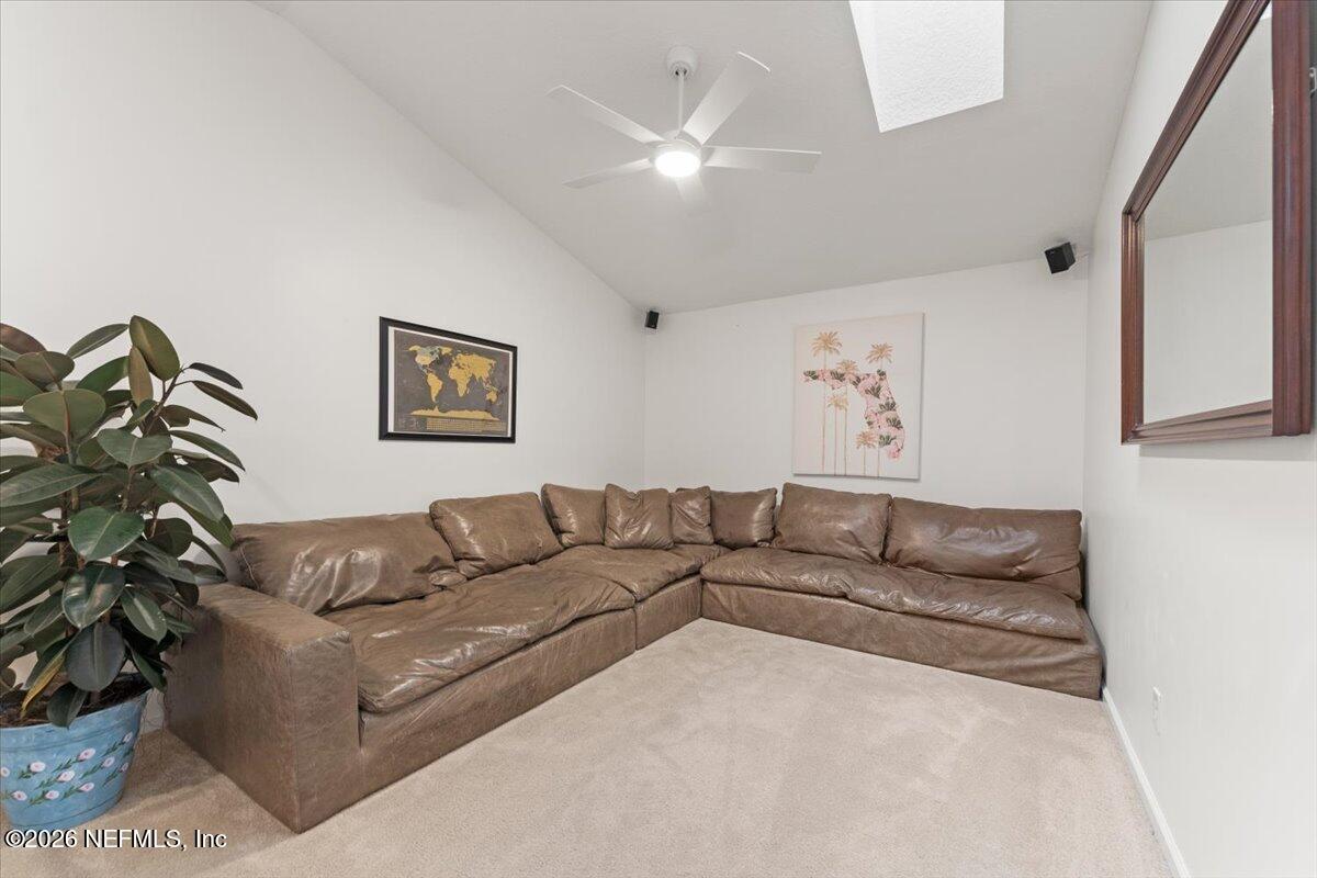 1489 Marshview Court Atlantic Beach, FL 32233 - Photo 25 of 47 a living room with furniture and a couch