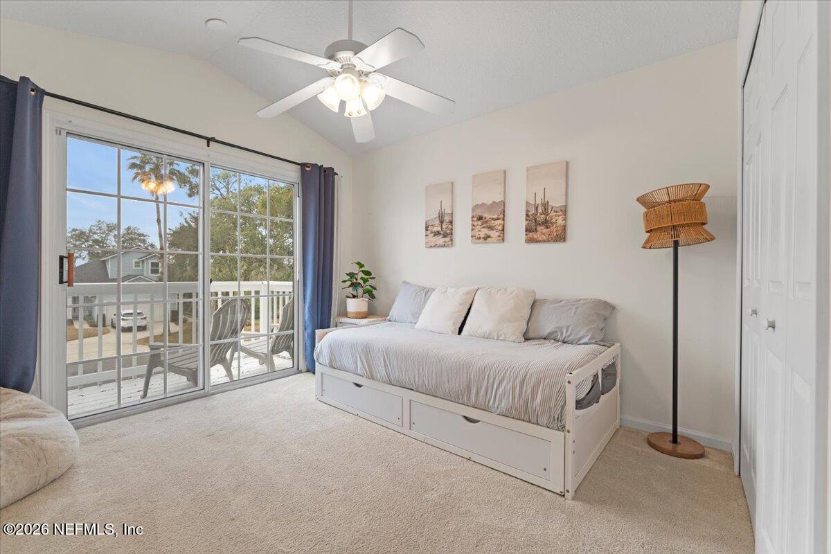 1489 Marshview Court Atlantic Beach, FL 32233 - Photo 27 of 47 a living room with furniture and a large window