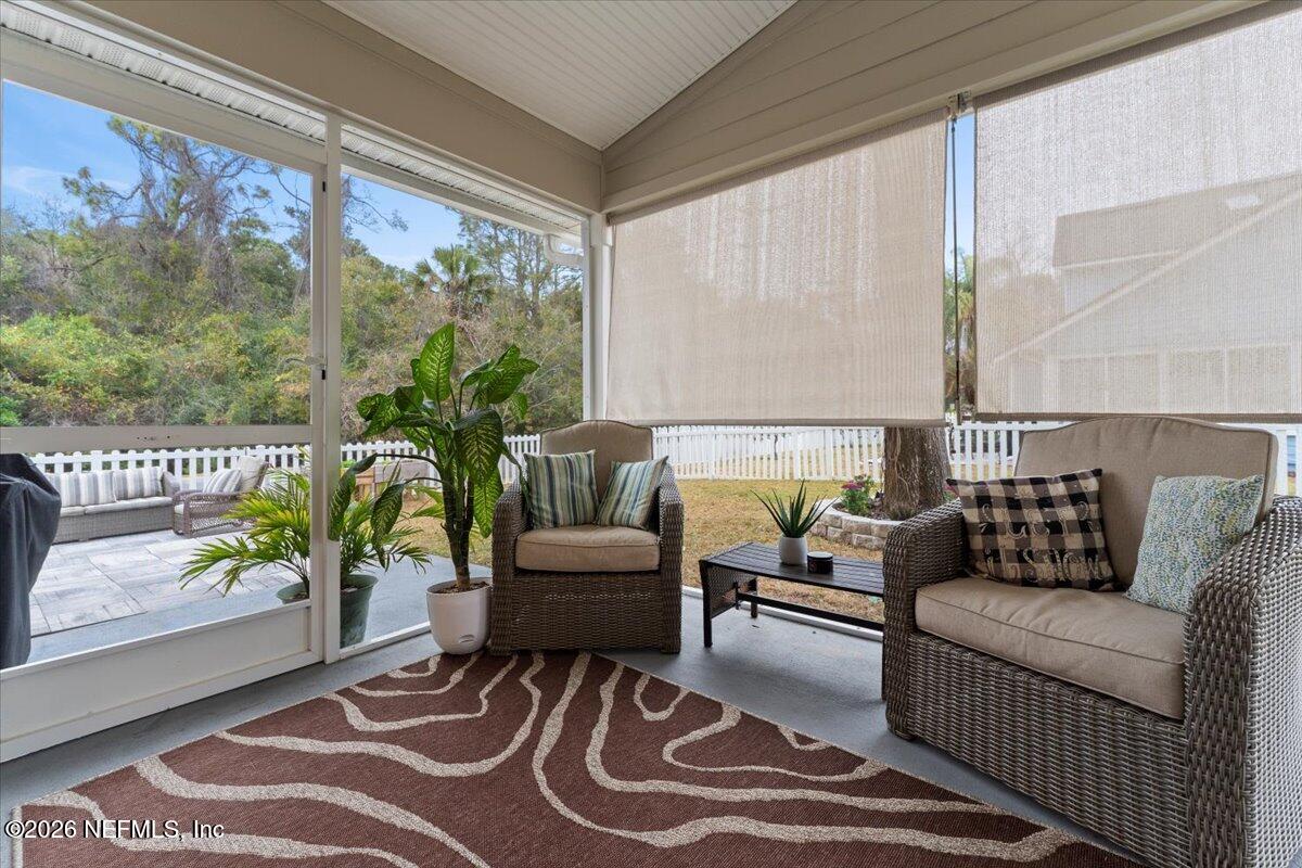1489 Marshview Court Atlantic Beach, FL 32233 - Photo 37 of 47 a living room with furniture and a large window with outer view