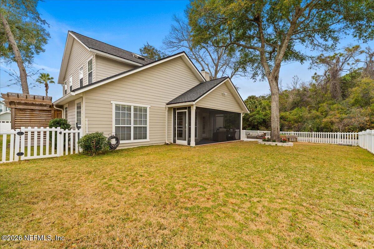 1489 Marshview Court Atlantic Beach, FL 32233 - Photo 39 of 47 a view of a house with a yard and potted plants