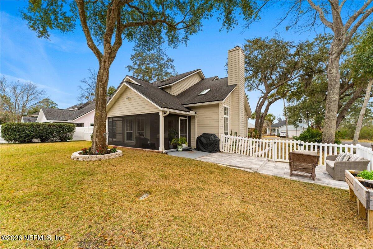 1489 Marshview Court Atlantic Beach, FL 32233 - Photo 40 of 47 a front view of a house with a yard and lake view