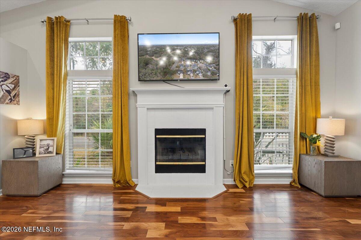 1489 Marshview Court Atlantic Beach, FL 32233 - Photo 8 of 47 a living room with furniture and a fireplace