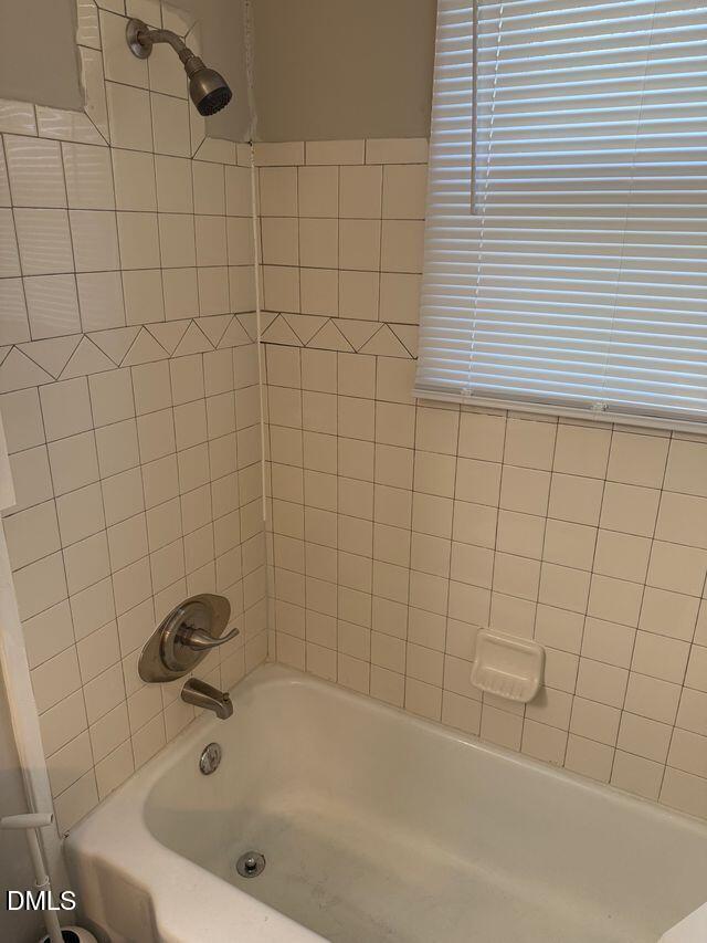 619 Old Oxford Road Durham, NC 27704 - Photo 17 of 22 a bathroom with a bathtub