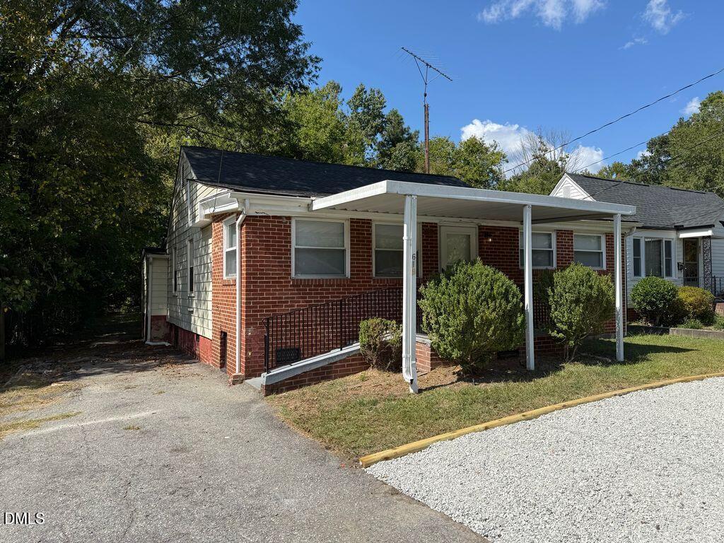 619 Old Oxford Road Durham, NC 27704 - Photo 2 of 22 front view of a house with a yard