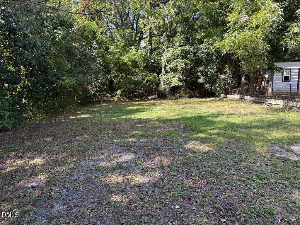 619 Old Oxford Road Durham, NC 27704 - Photo 22 of 22 a view of outdoor space with trees