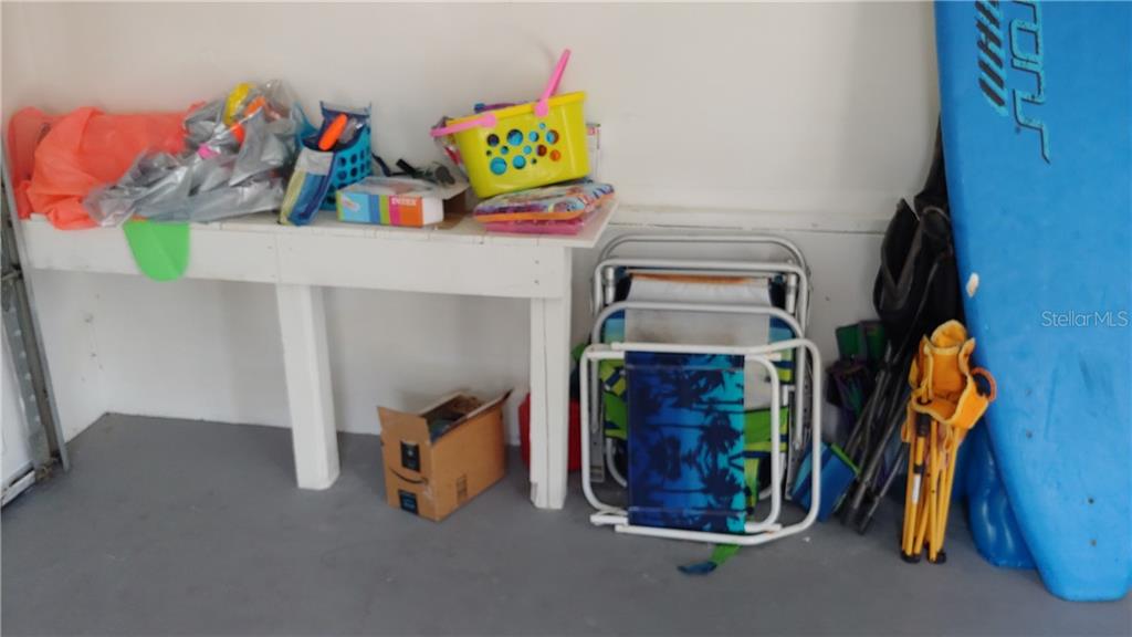 309 Shore T Road Nokomis, FL 34275 - Photo 41 of 42 a room with toys and storage