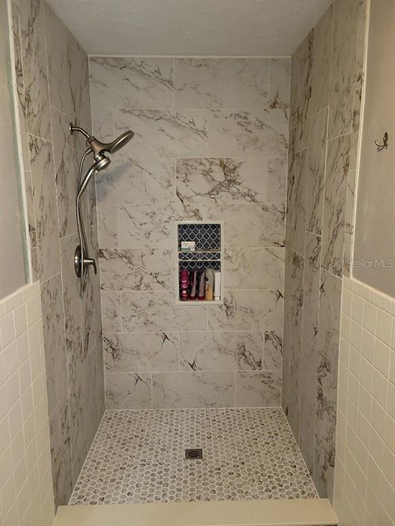 309 Shore T Road Nokomis, FL 34275 - Photo 10 of 42 a bathroom with a shower