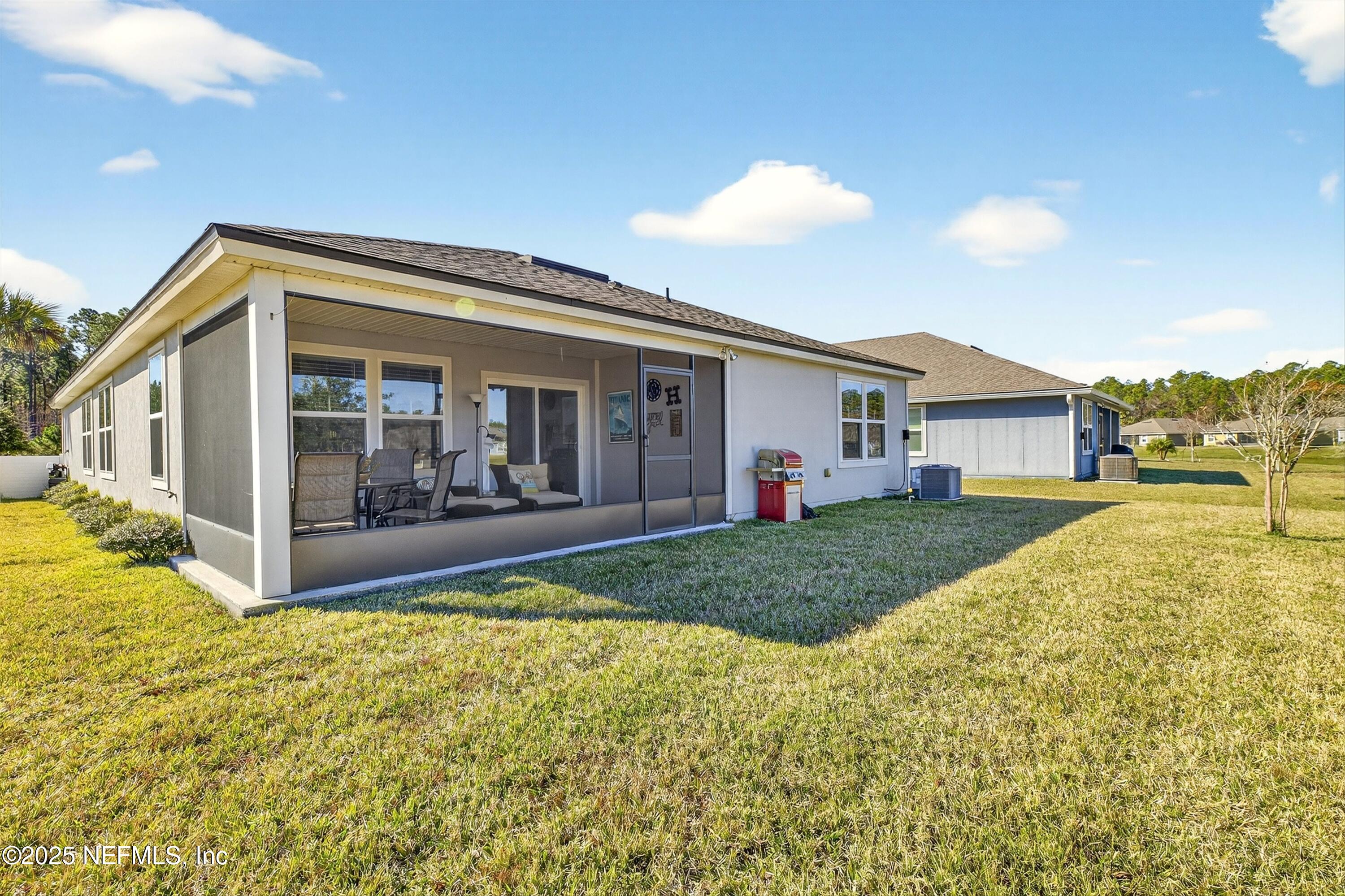 70 Spoonbill Circle St. Augustine, FL 32095 - Photo 37 of 76 a view of a house with a patio