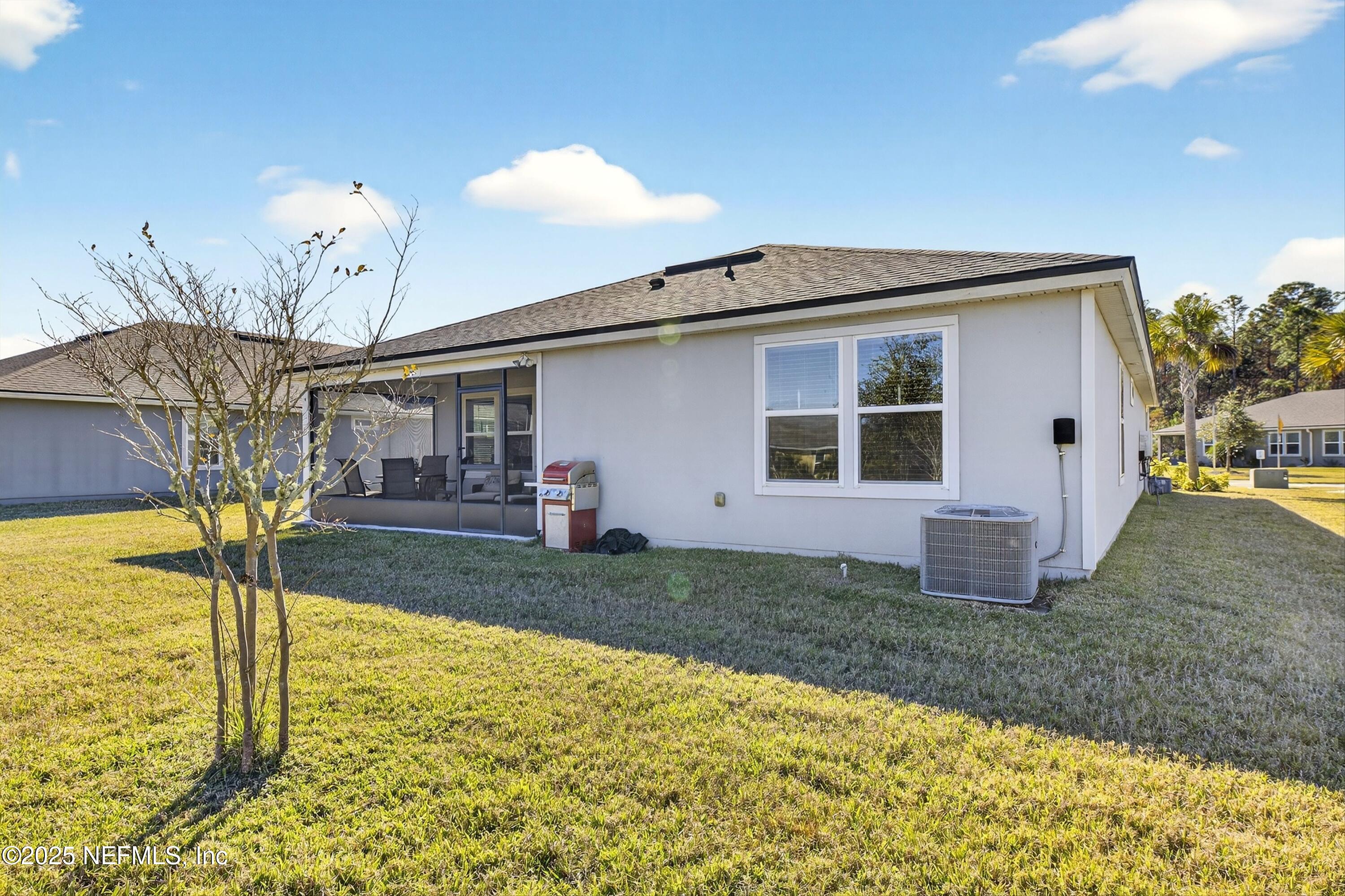 70 Spoonbill Circle St. Augustine, FL 32095 - Photo 39 of 76 a view of a house with backyard and porch