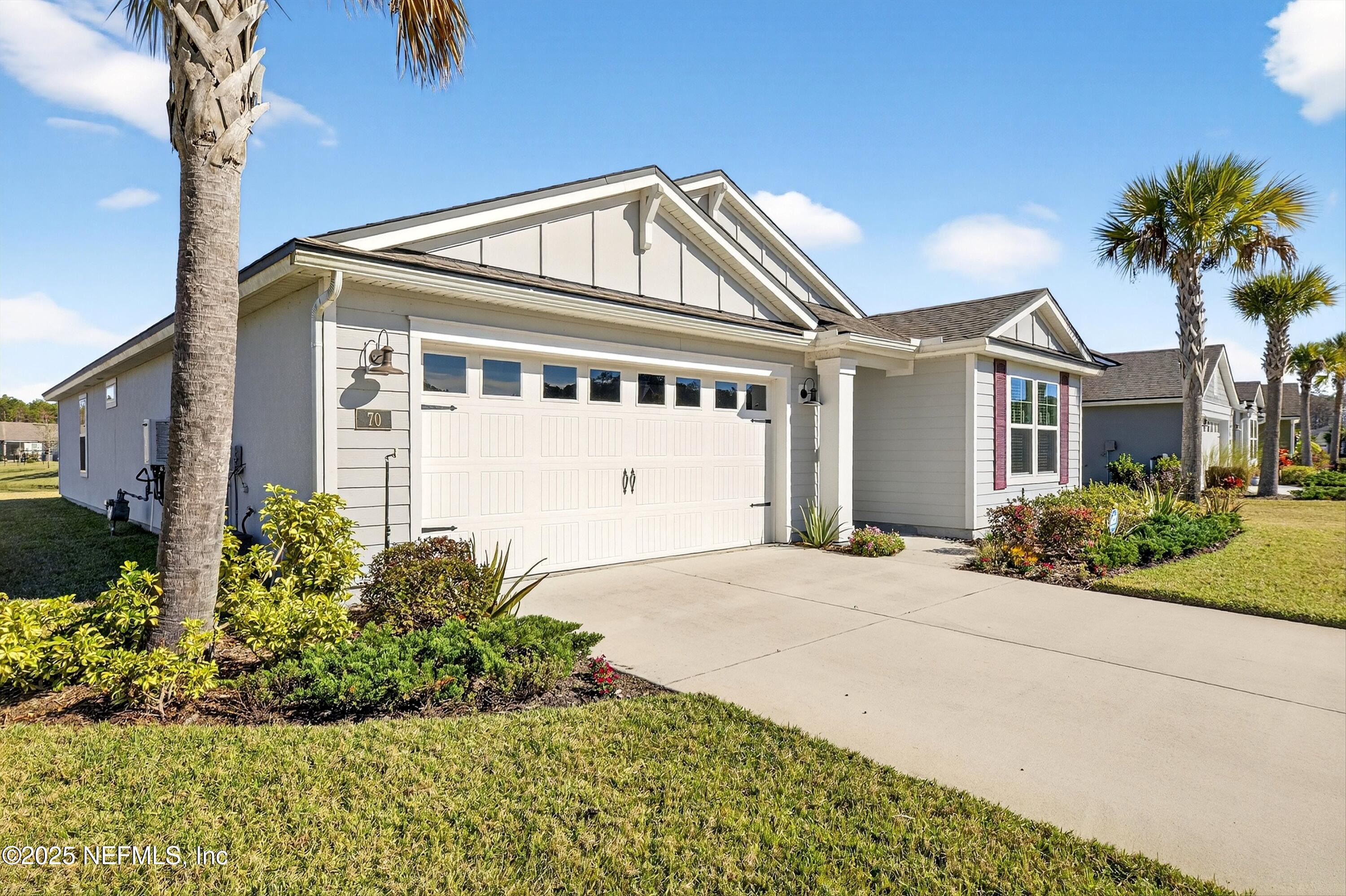 70 Spoonbill Circle St. Augustine, FL 32095 - Photo 4 of 76 a front view of a house with a yard