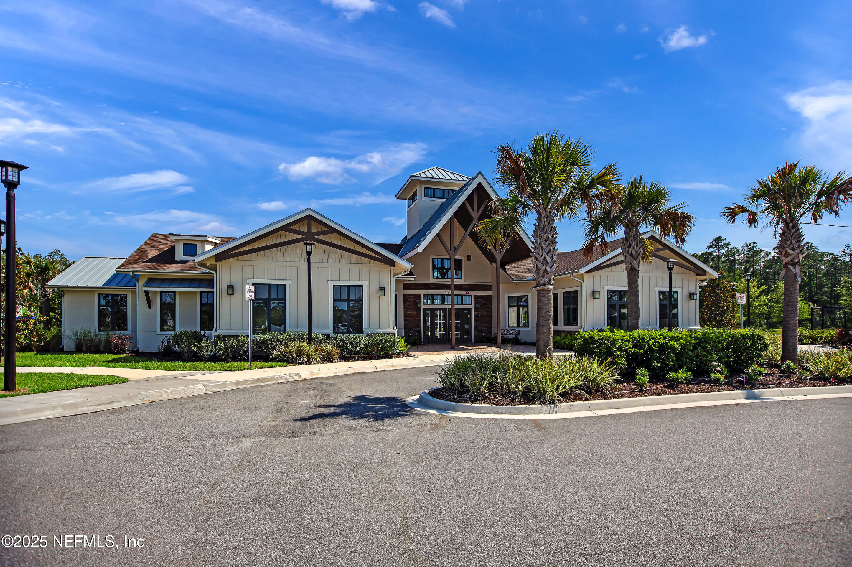 70 Spoonbill Circle St. Augustine, FL 32095 - Photo 44 of 76 a front view of a house with a yard and trees