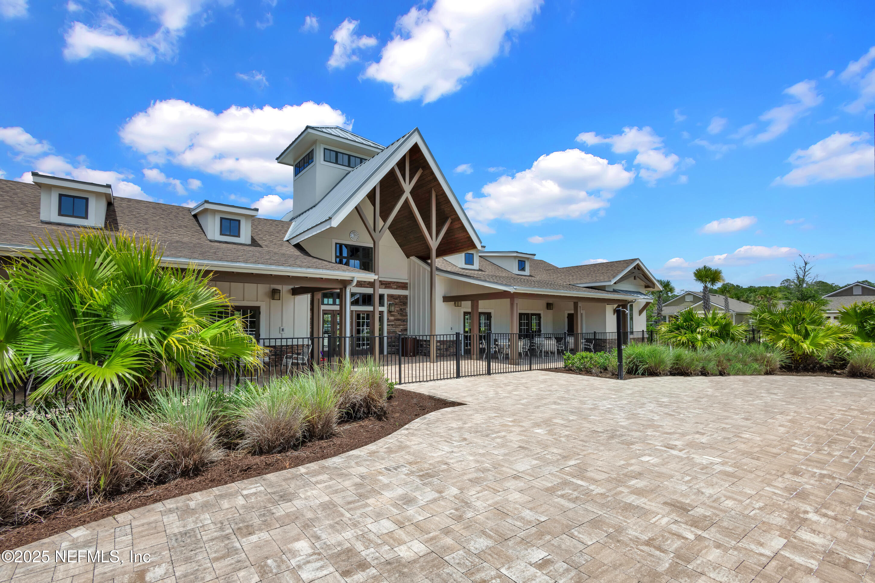 70 Spoonbill Circle St. Augustine, FL 32095 - Photo 46 of 76 a front view of a house with a garden