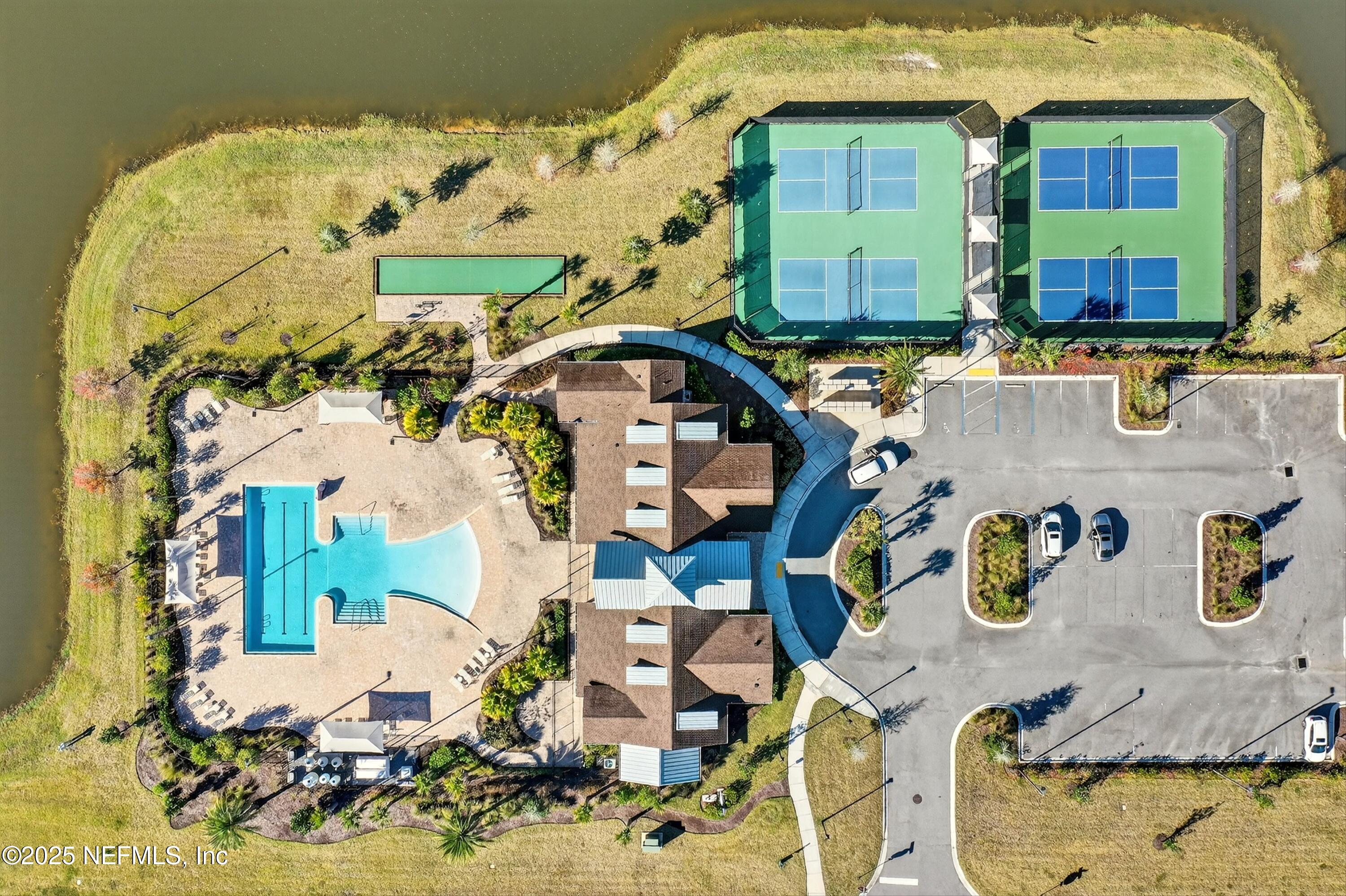 70 Spoonbill Circle St. Augustine, FL 32095 - Photo 55 of 76 an aerial view of a house with a swimming pool