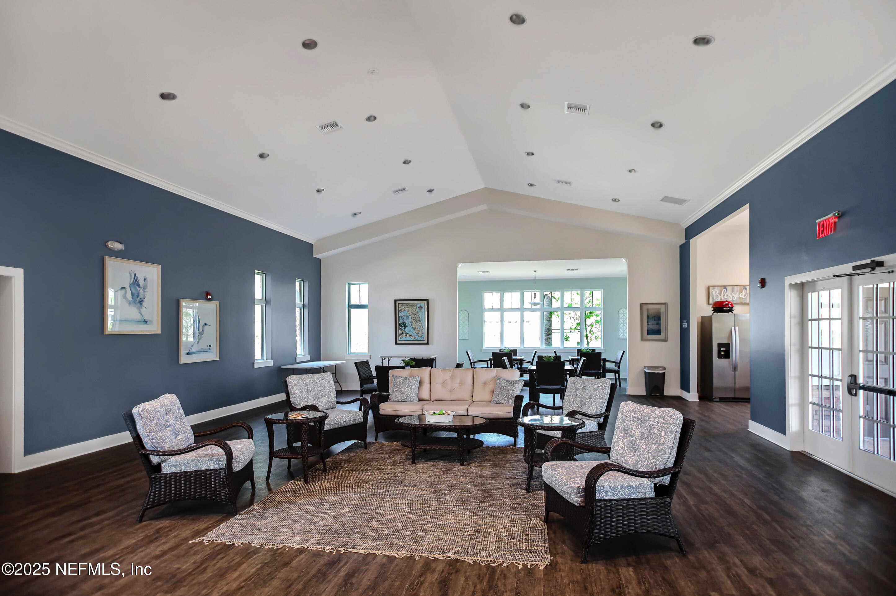 70 Spoonbill Circle St. Augustine, FL 32095 - Photo 60 of 76 a living room with furniture and wooden floor