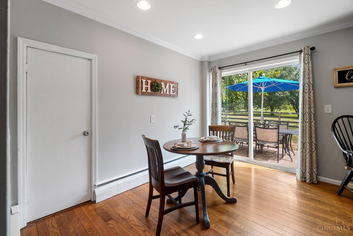 5381 Princeton Road Hamilton, OH 45011 - Photo 17 of 67 Kitchen dining with Pella sliding door to patio.