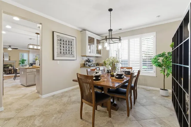 a kitchen with stainless steel appliances granite countertop a stove a sink and a granite counter tops