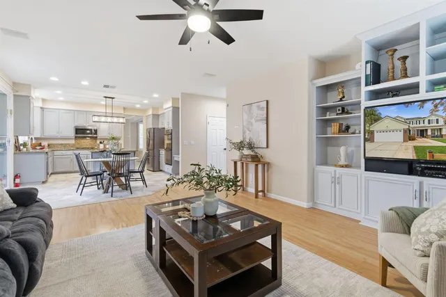 a view of a dining room with furniture and window
