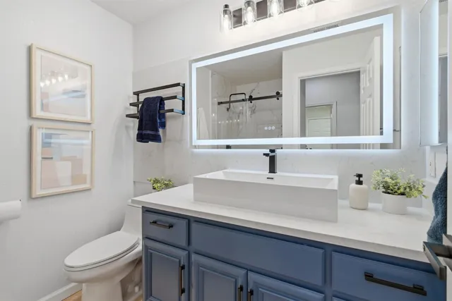 a room with furniture and wooden floor