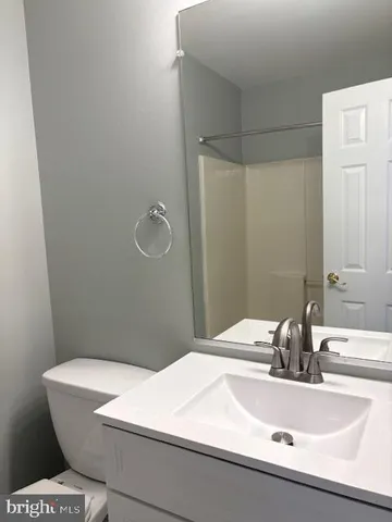 a bathroom with a sink and a toilet
