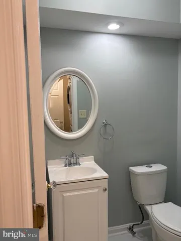 a bathroom with a toilet and a sink
