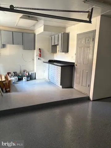 a bedroom with a bed and a walk in closet