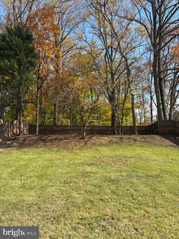 a view of swimming pool with trees