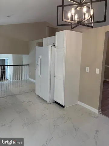 a view of a livingroom with a staircase