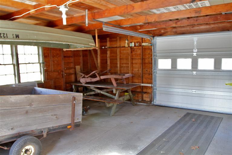 575 Great Pond Road Eastham, MA 02642 - Photo 8 of 23 a bedroom with bed and a window
