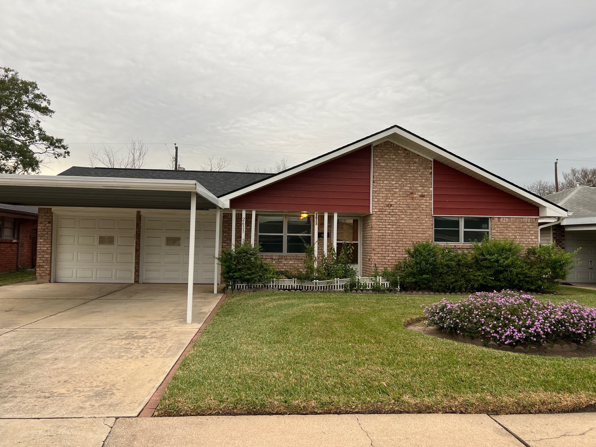 front view of a house with a yard