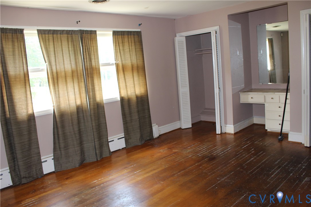 1645 Wilton Road Petersburg, VA 23805 - Photo 7 of 12 Hardwood flooring, multiple windows, built-in vani