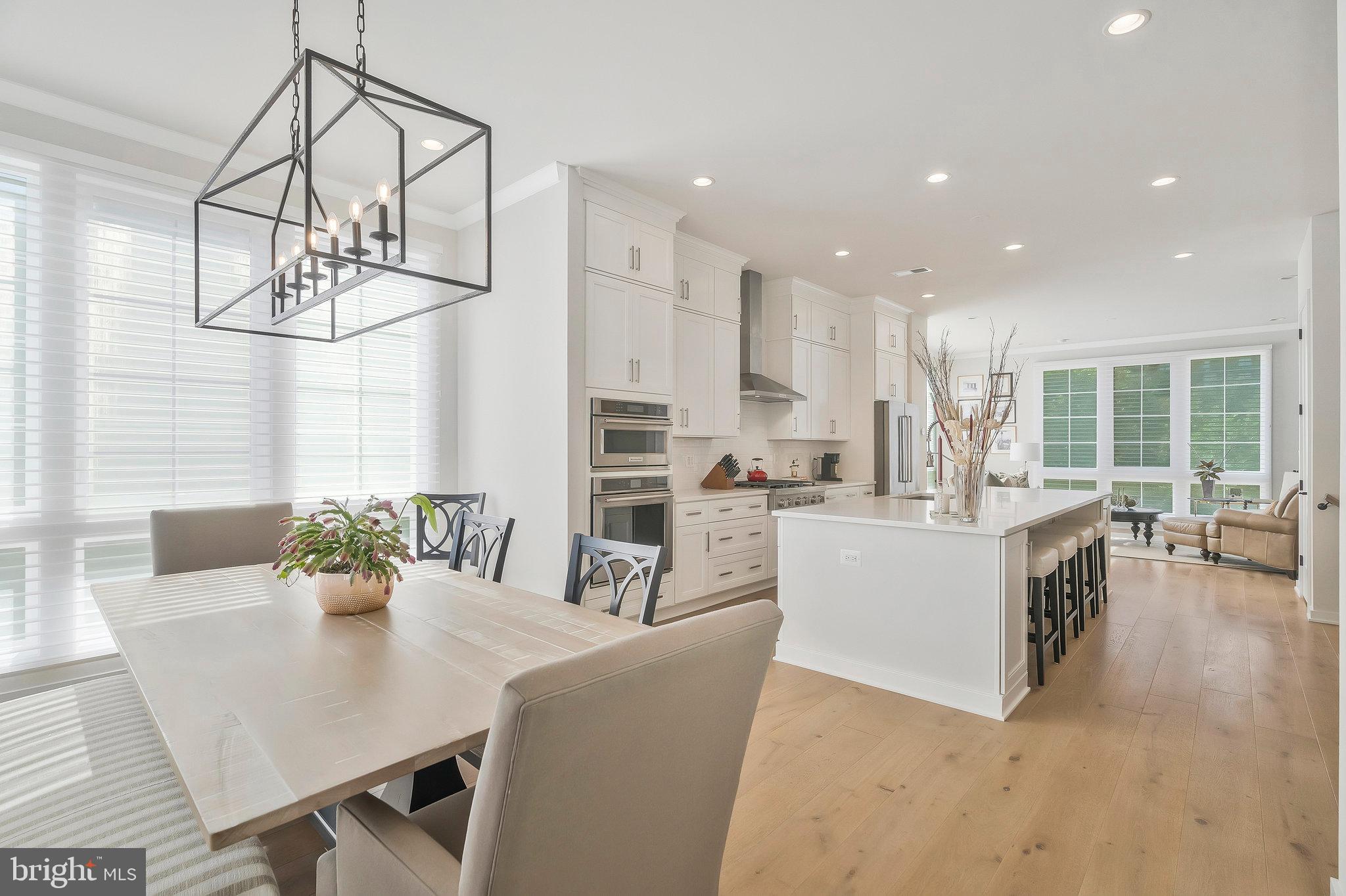 1968 Roland Clarke Place Reston, VA 20191 - Photo 12 of 36 Views to kitchen from dining area