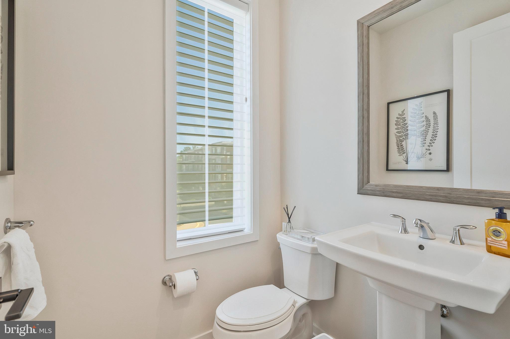 1968 Roland Clarke Place Reston, VA 20191 - Photo 18 of 36 Main level powder room