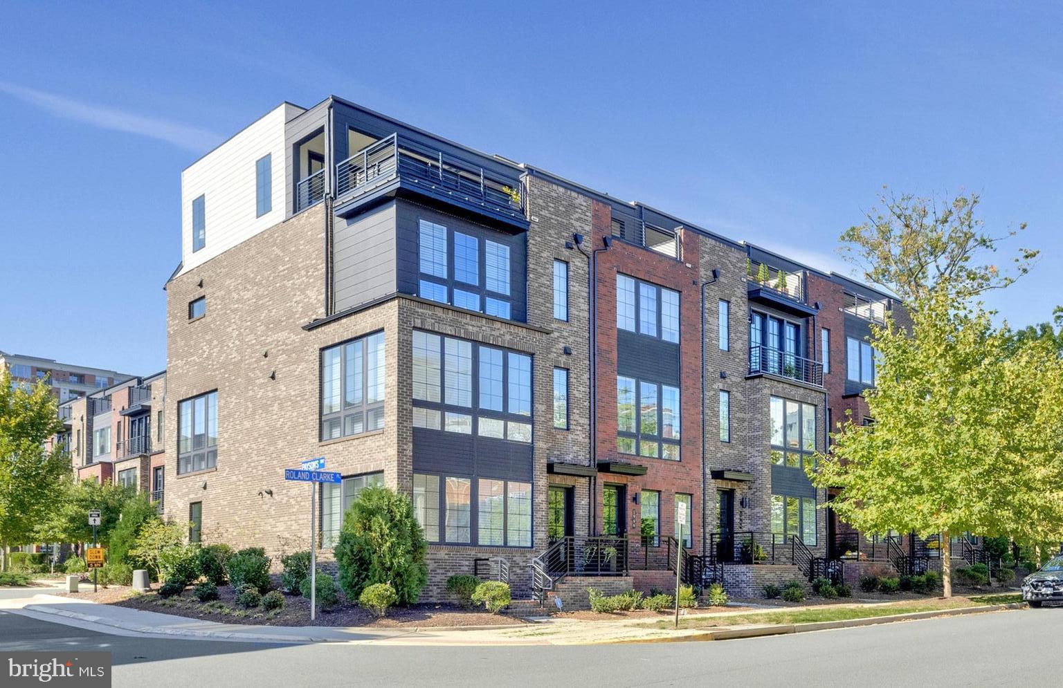 1968 Roland Clarke Place Reston, VA 20191 - Photo 2 of 36 Arrival view of end unit townhome