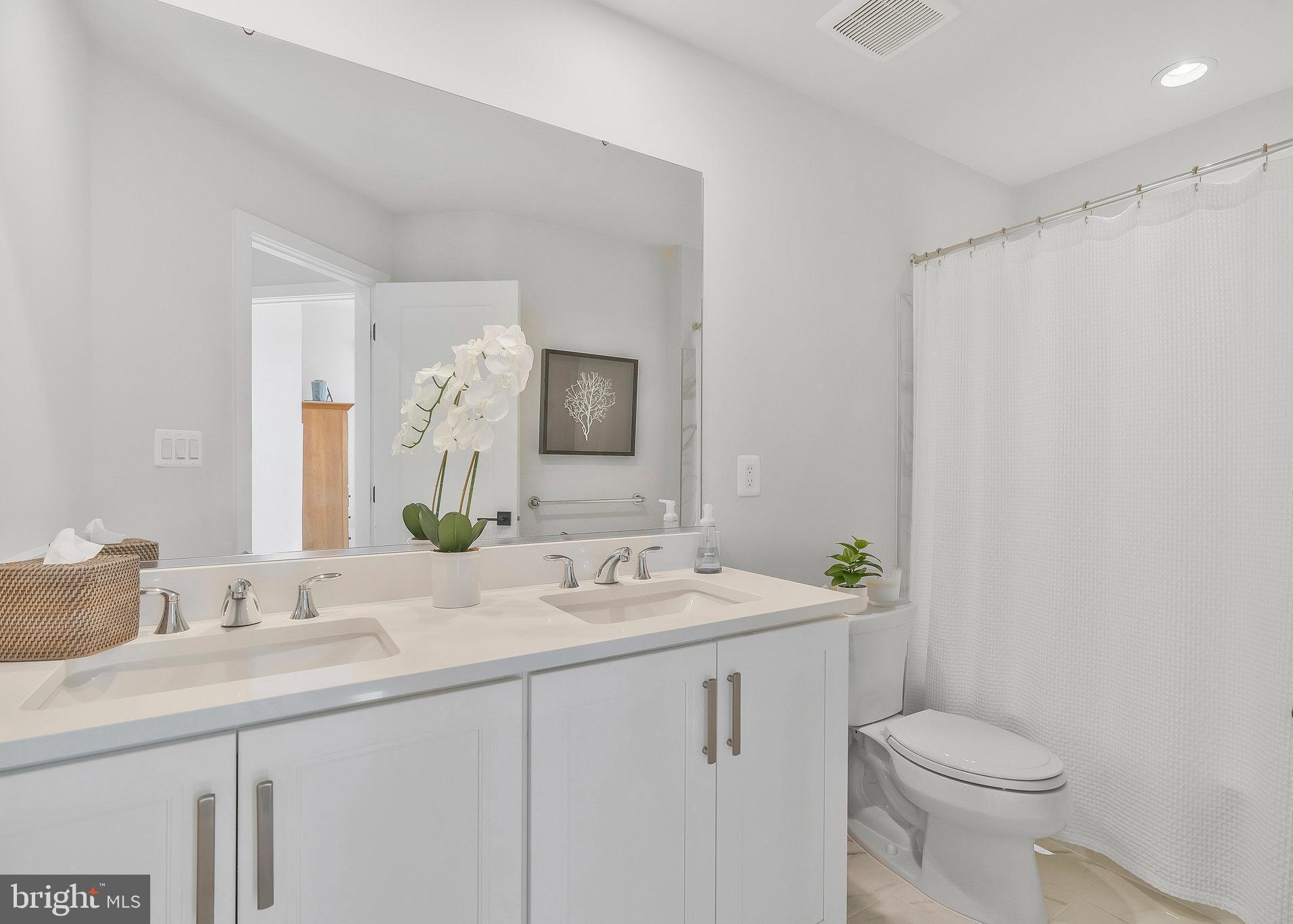 1968 Roland Clarke Place Reston, VA 20191 - Photo 22 of 36 3rd floor bathroom with double vanity