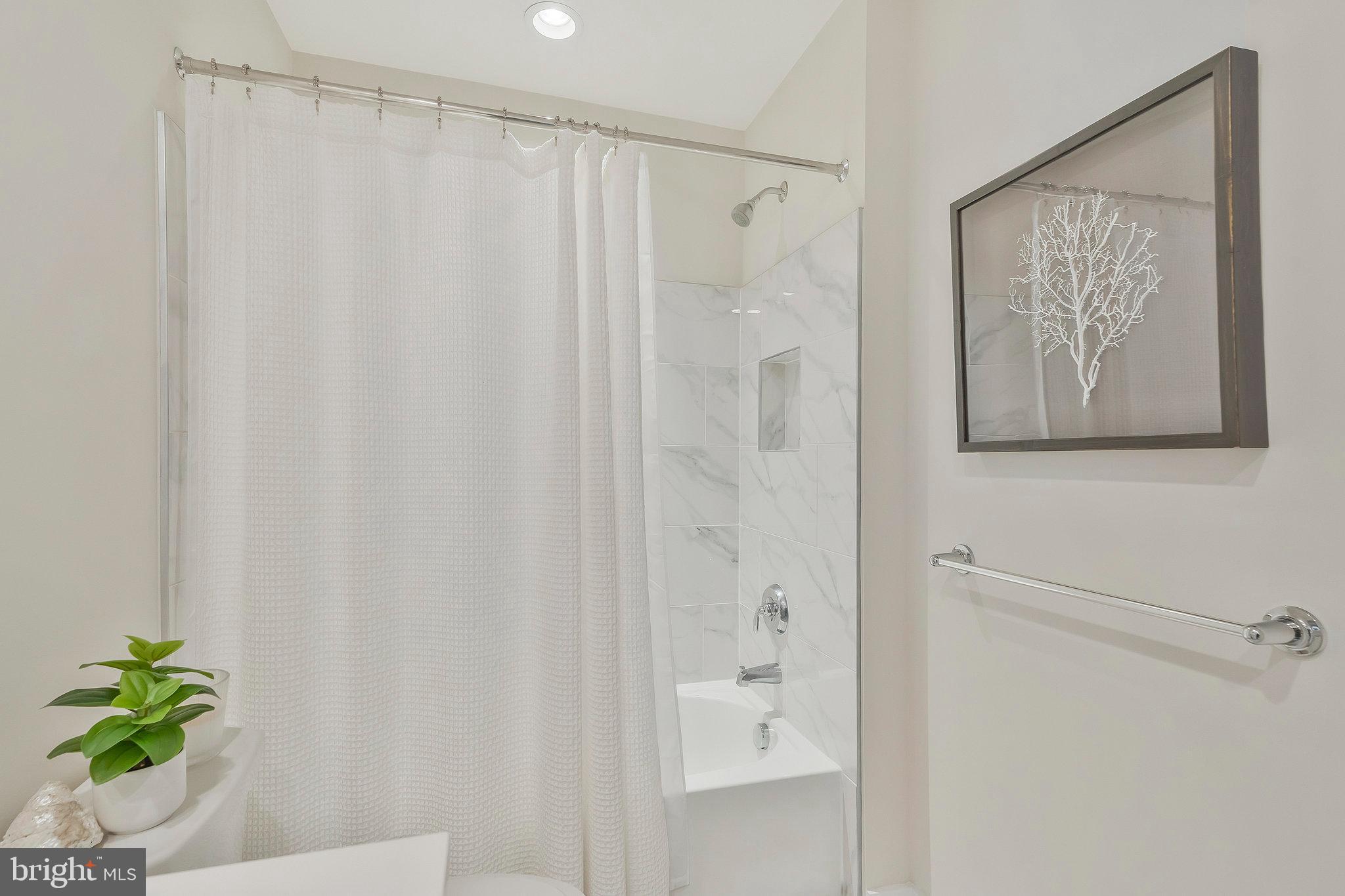 1968 Roland Clarke Place Reston, VA 20191 - Photo 23 of 36 3rd floor bathroom with tub/shower