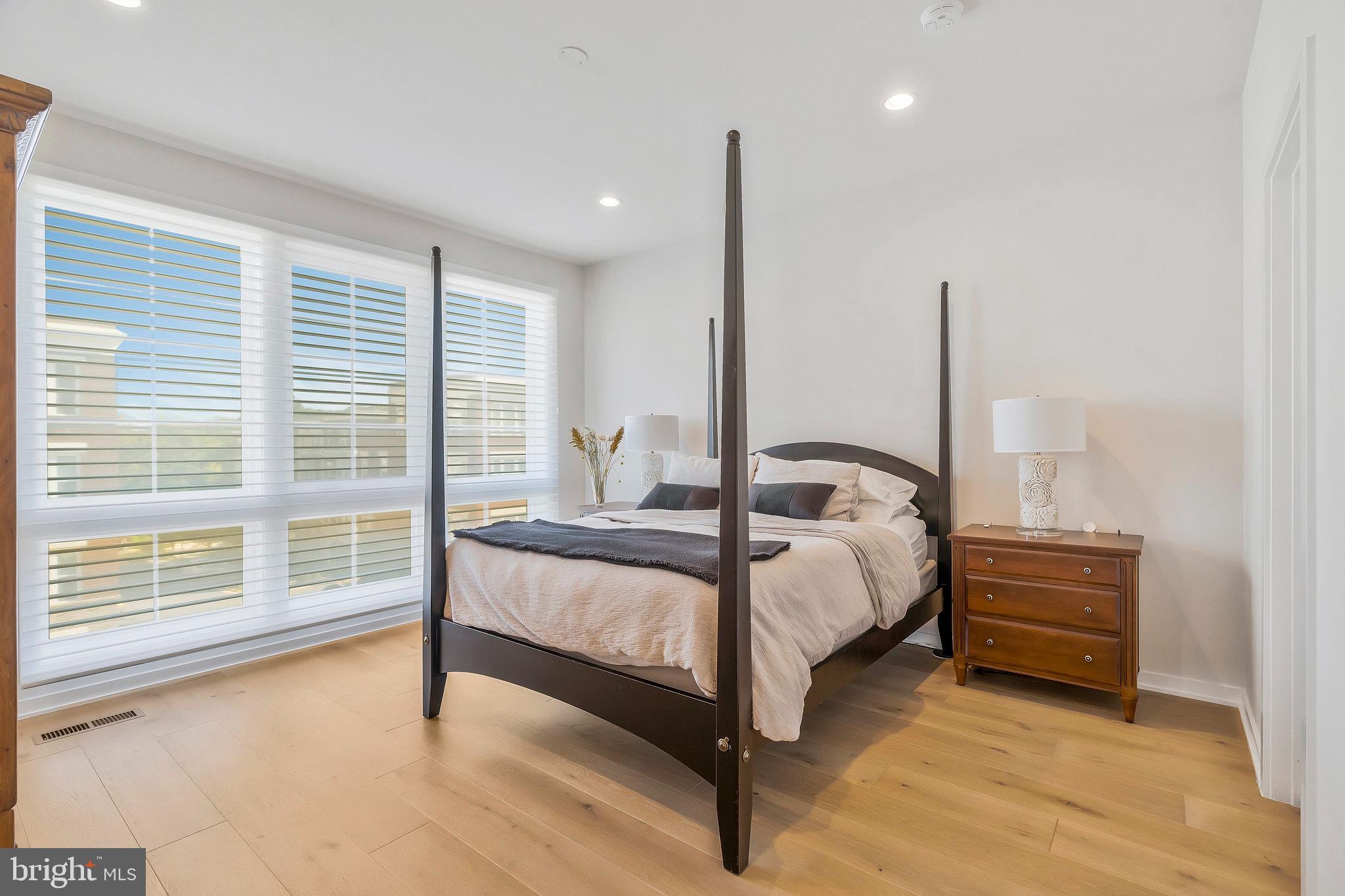 1968 Roland Clarke Place Reston, VA 20191 - Photo 24 of 36 3rd floor primary bedroom