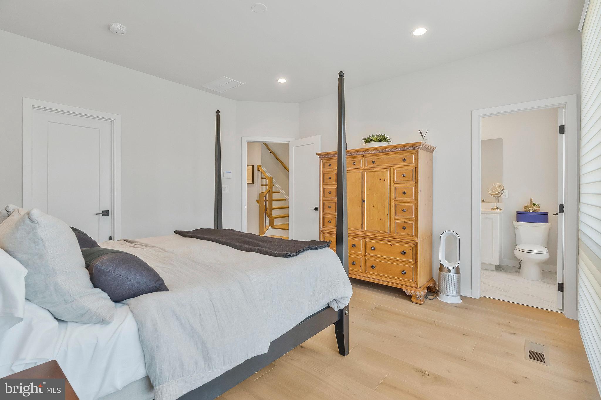 1968 Roland Clarke Place Reston, VA 20191 - Photo 25 of 36 Ensuite primary with walk-in closet