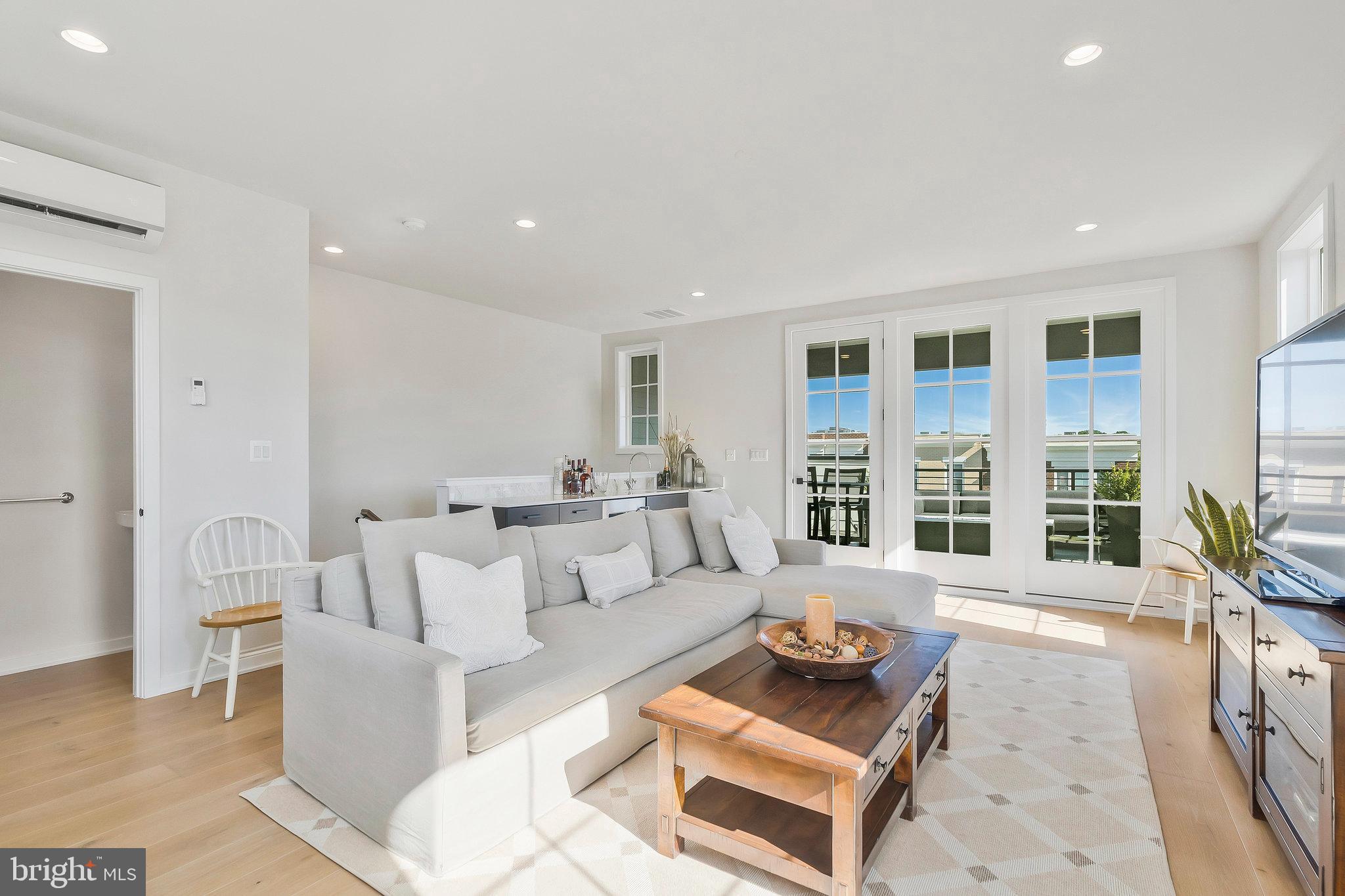 1968 Roland Clarke Place Reston, VA 20191 - Photo 30 of 36 French door access to rooftop terrace