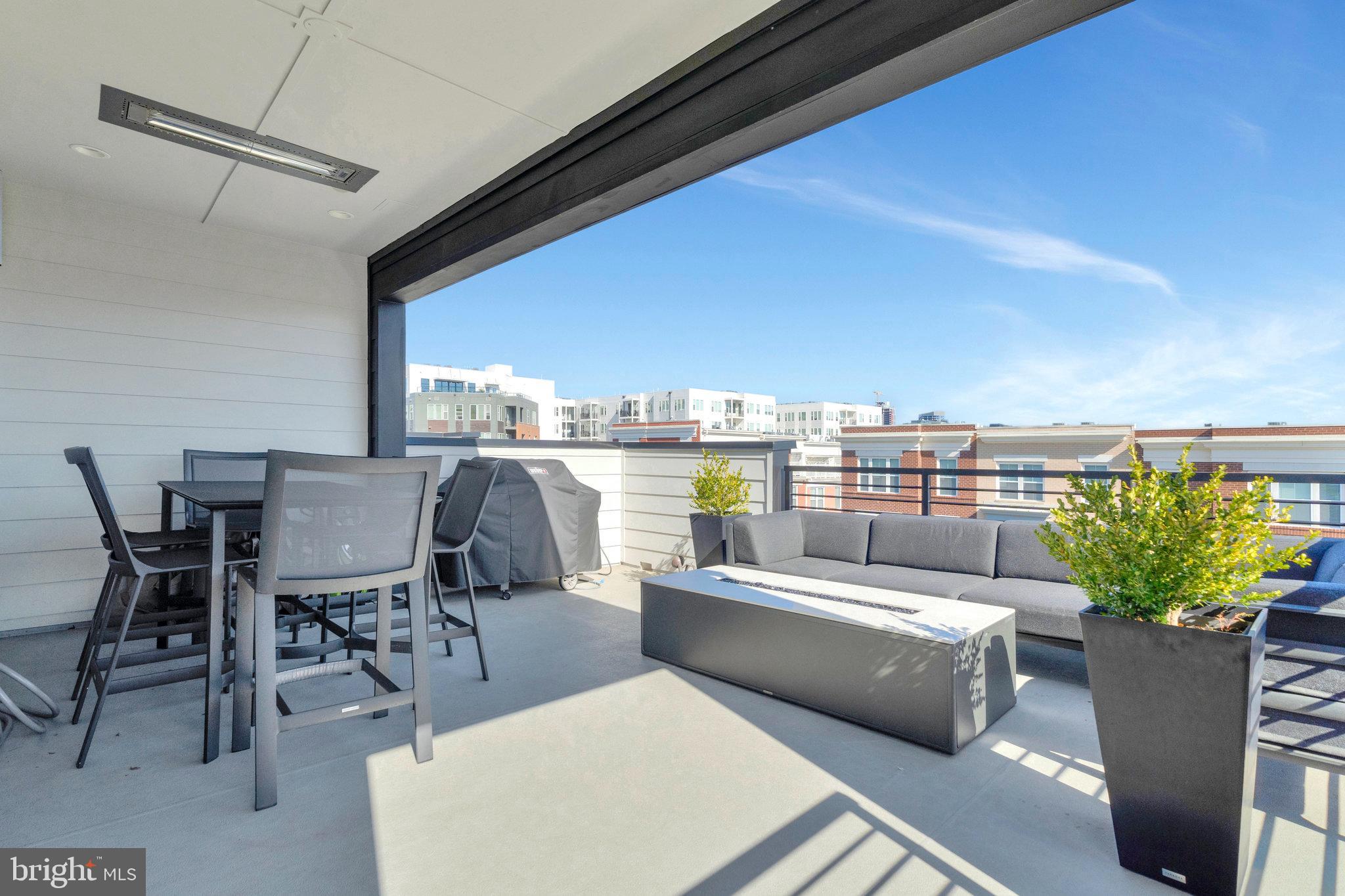 1968 Roland Clarke Place Reston, VA 20191 - Photo 33 of 36 Rooftop terrace with radiant heaters