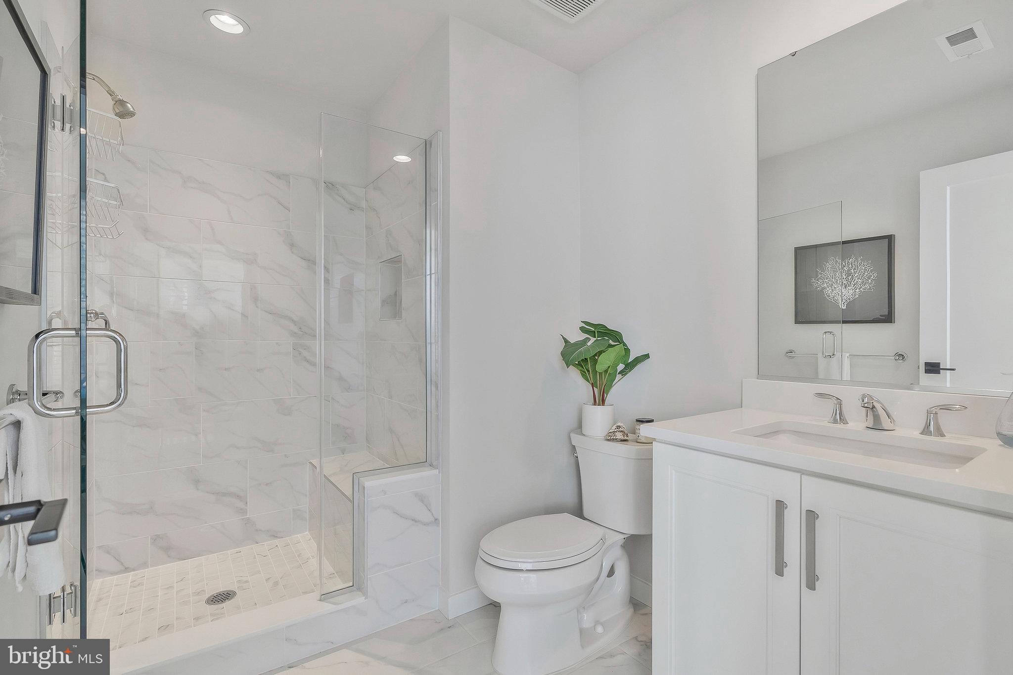 1968 Roland Clarke Place Reston, VA 20191 - Photo 6 of 36 Entry level full bath with walk in shower