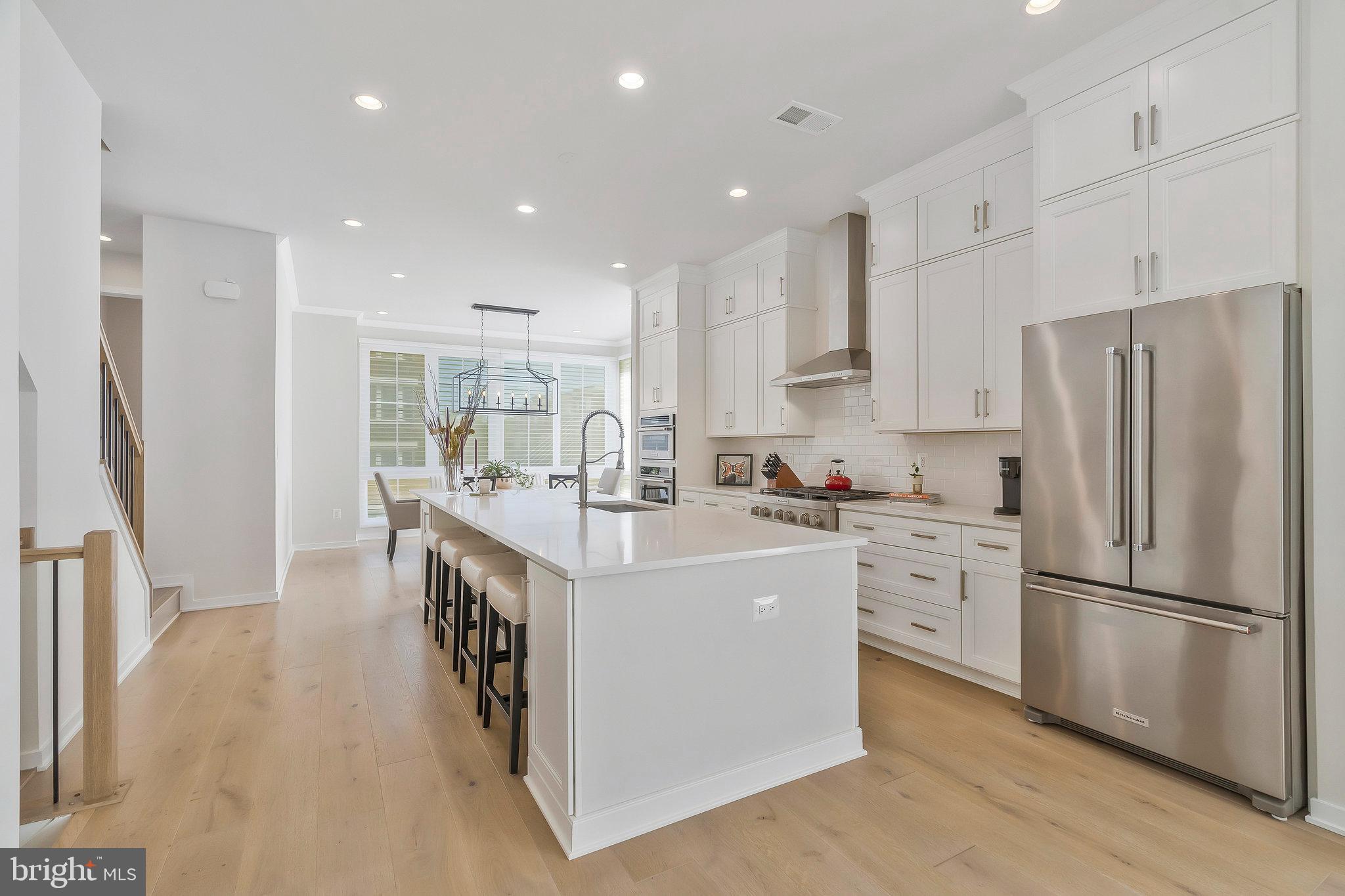 1968 Roland Clarke Place Reston, VA 20191 - Photo 8 of 36 Beautiful main level gourmet kitchen