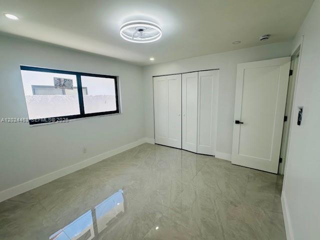 11870 Southwest 5th Street, Unit 1 Miami, FL 33184 - Photo 29 of 38 an empty room with windows