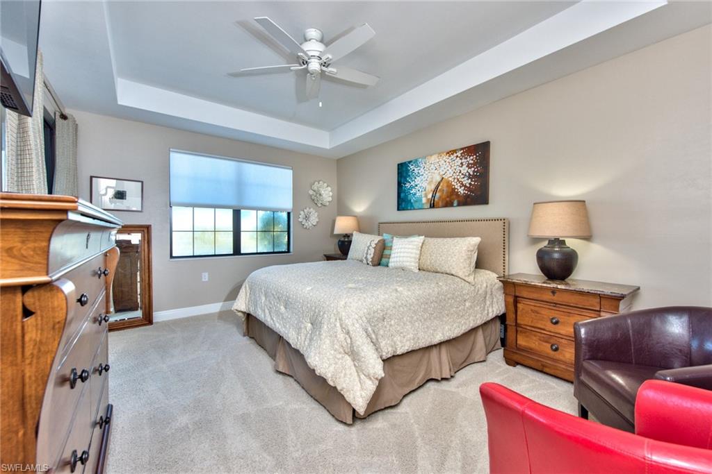 10470 Casella Way, Unit 101 Fort Myers, FL 33913 - Photo 13 of 34 a bedroom with bed and window