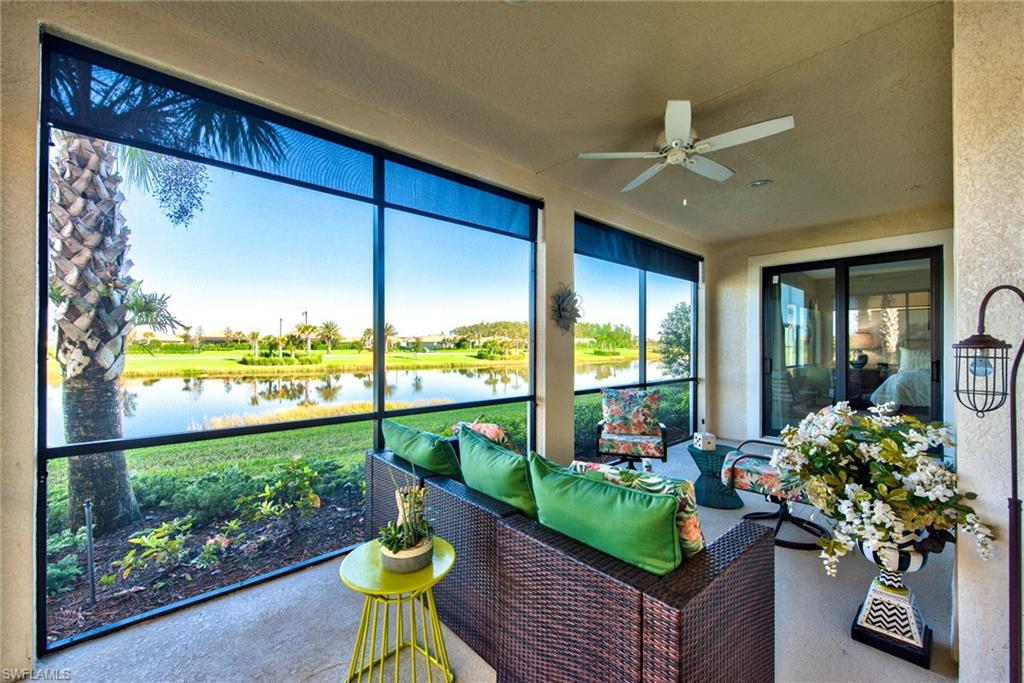 10470 Casella Way, Unit 101 Fort Myers, FL 33913 - Photo 21 of 34 a living room filled with furniture and a garden