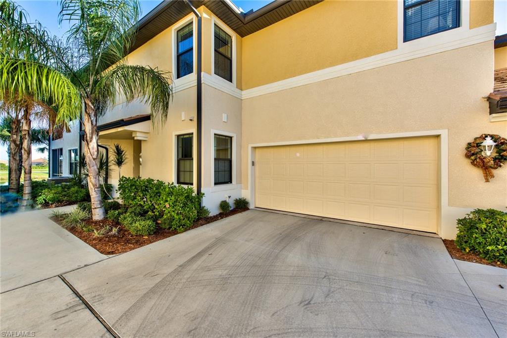 10470 Casella Way, Unit 101 Fort Myers, FL 33913 - Photo 23 of 34 a view of a house with a street