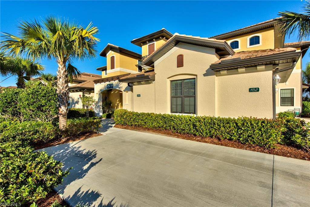 10470 Casella Way, Unit 101 Fort Myers, FL 33913 - Photo 24 of 34 front view of a house with a street