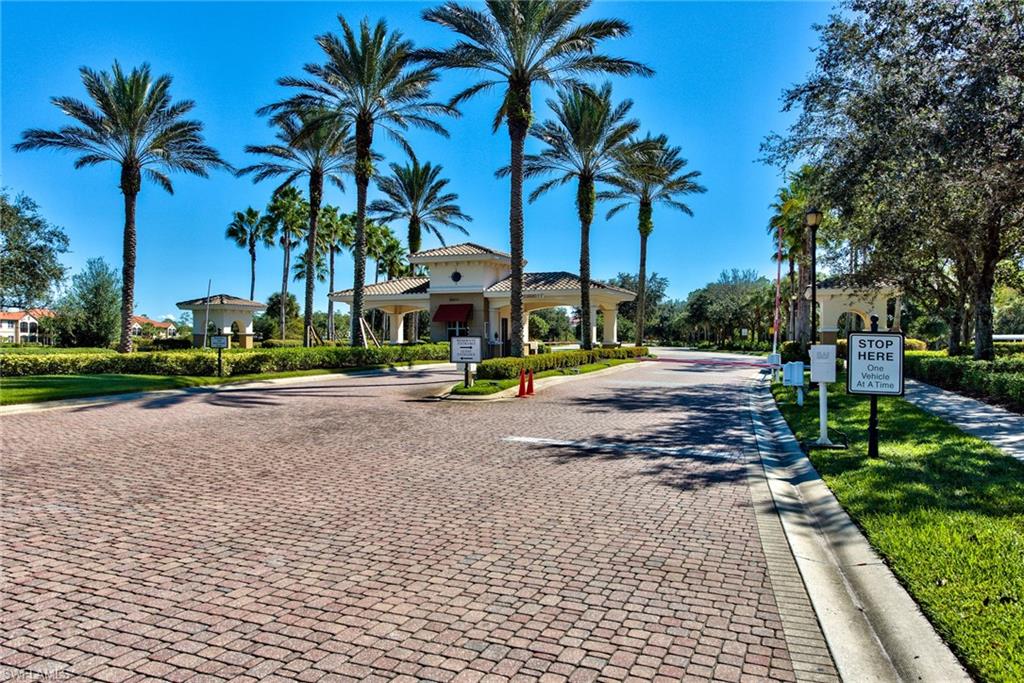 10470 Casella Way, Unit 101 Fort Myers, FL 33913 - Photo 34 of 34 a street view with palm trees